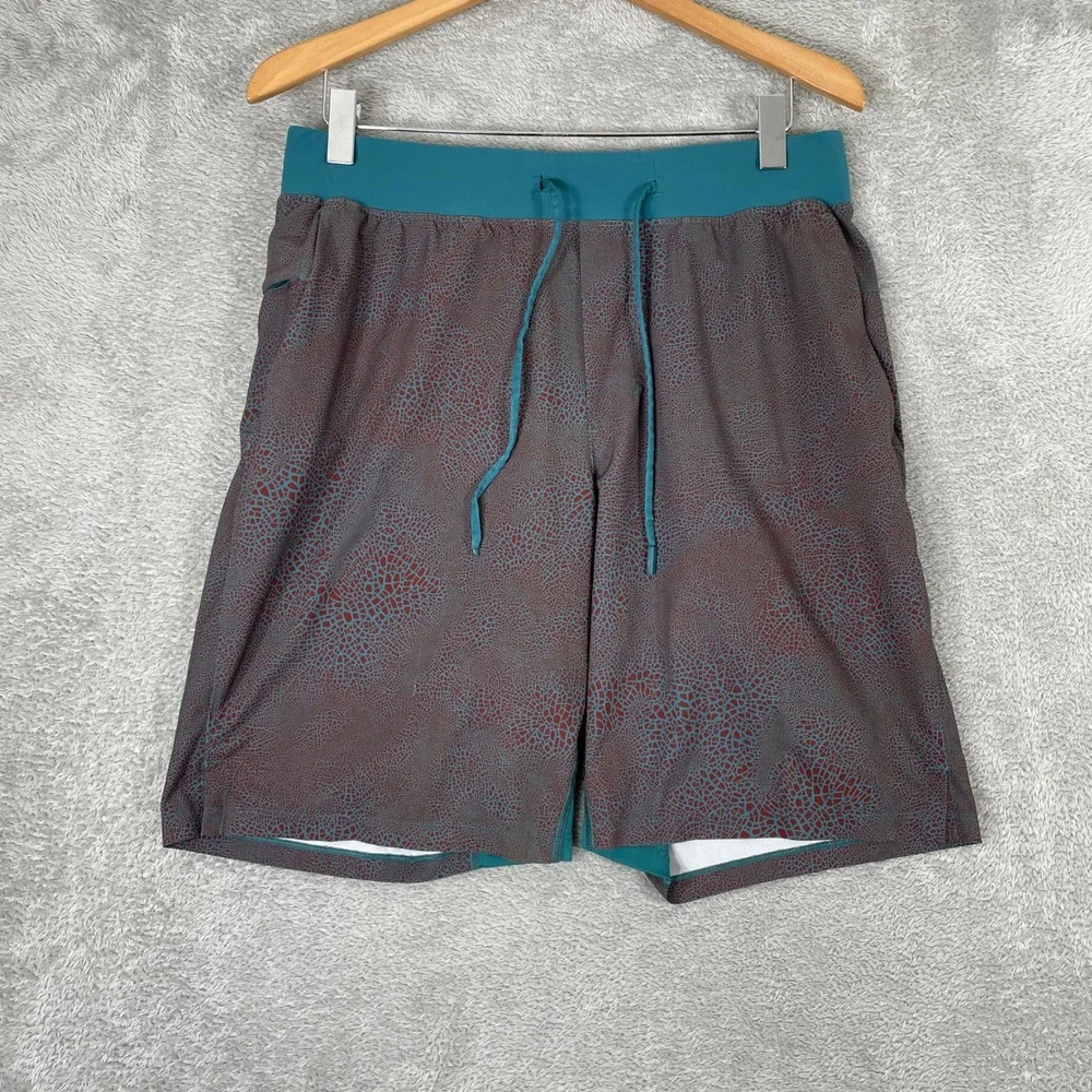 Lululemon Pace Breaker Shorts Mens Large Teal Red Geometric Training Gym 7 inch
